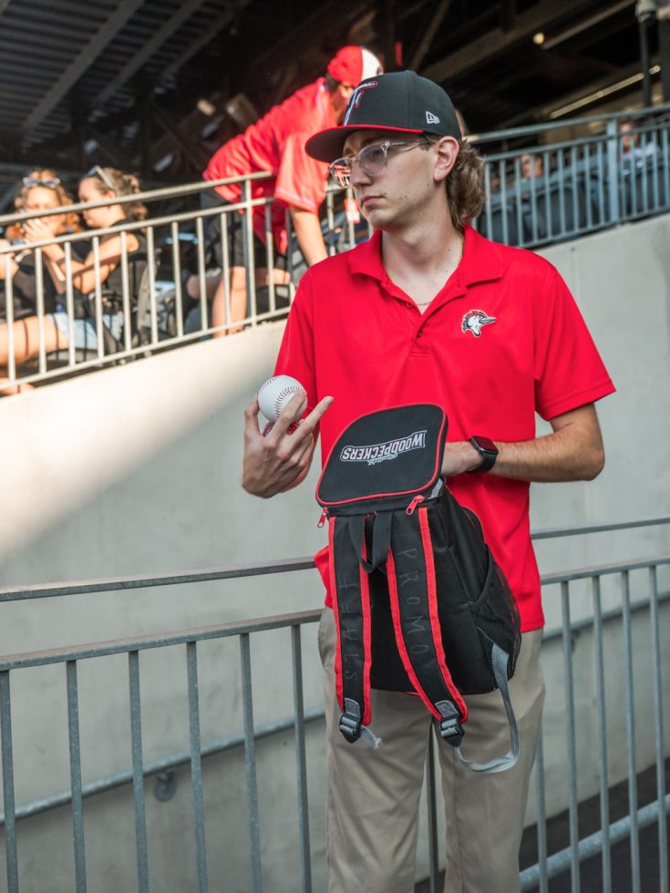 Student interns at a Woodpeckers game