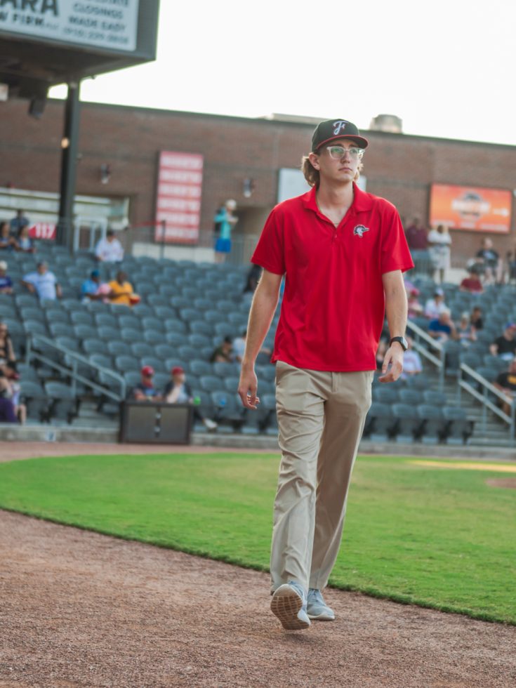 Student interns at a Woodpeckers game