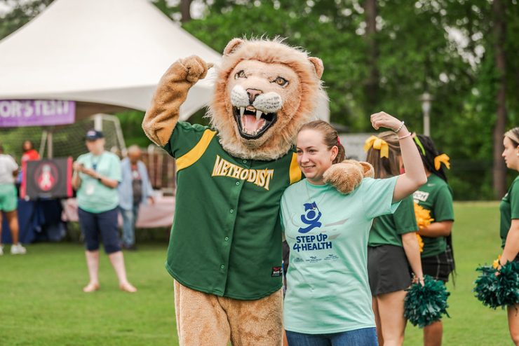 King poses with a participant at Step Up 4 Health 2024