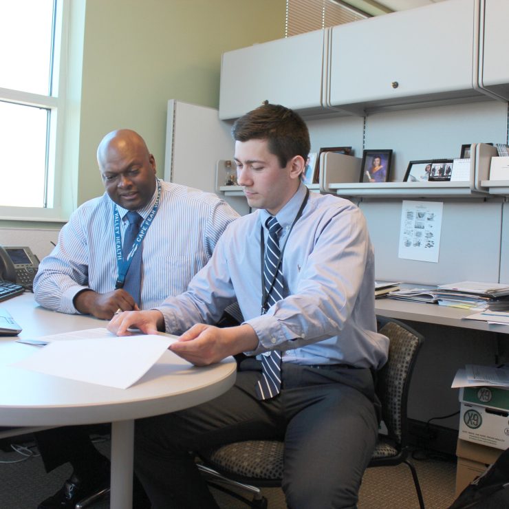 MU Student Antonio Fish working with a supervisor at Cape Fear Valley Health Hoke