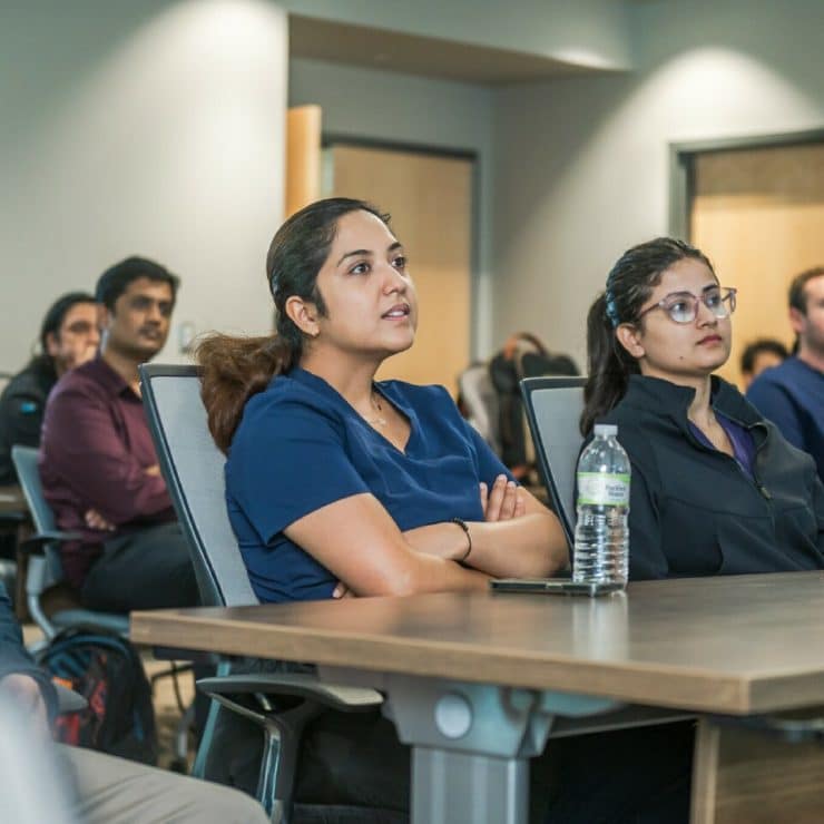 Medical students listen to a lecture