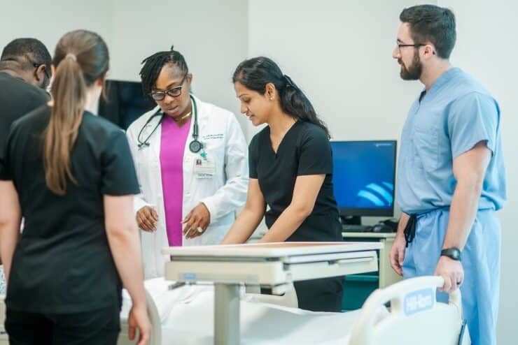 Medical Faculty work with students