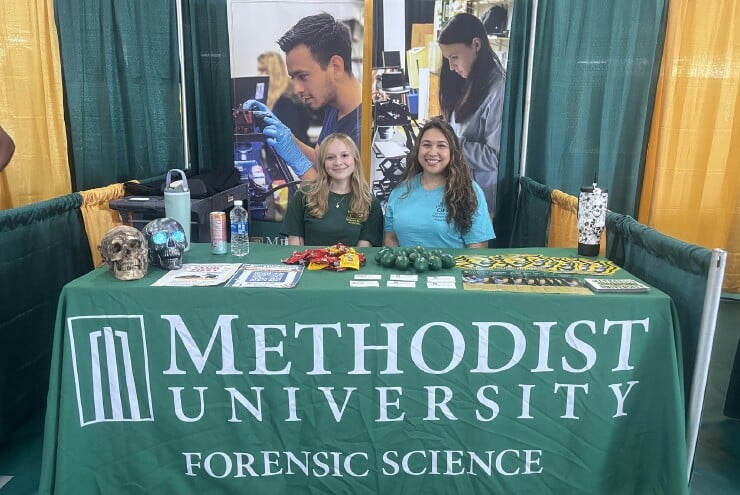 Forensic Science students at a booth