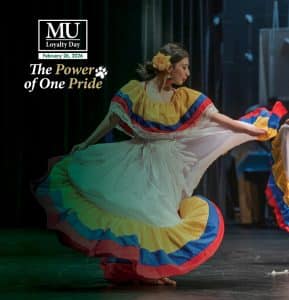 A student performs at Pangea with the Methodist University Loyalty Day logo