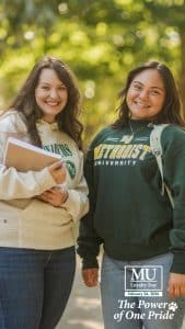Students walking on campus with the Methodist University Loyalty Day logo