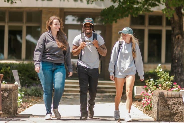 Students walking in front of Stout Hall