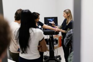 Dr. Elizabeth Gignac leads a demonstration for incoming medical students