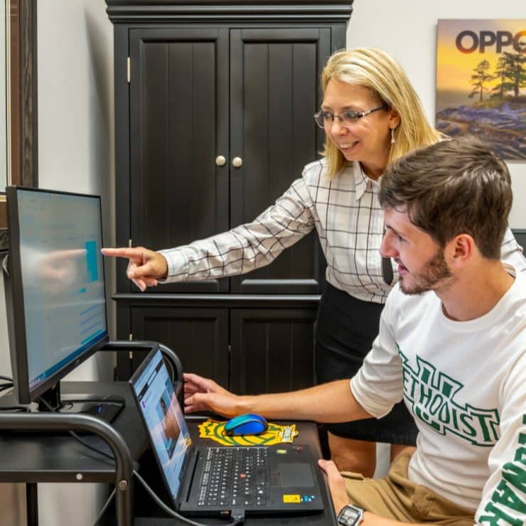 Professor Samantha Inczauskis with a Student