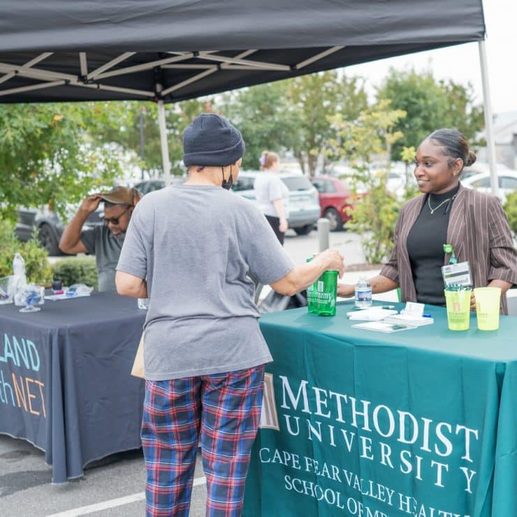 Community Engagement Manager D'Asia Johnson at Fayetteville Cares