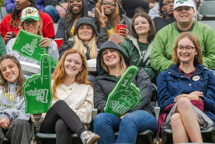 Students attend the Homecoming Football Game