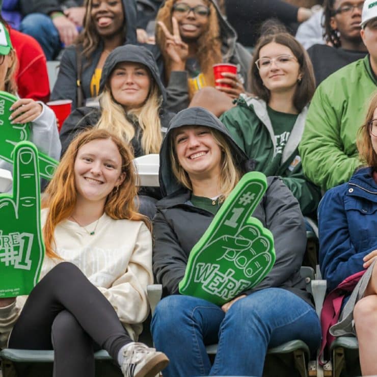 Students attend the Homecoming Football Game