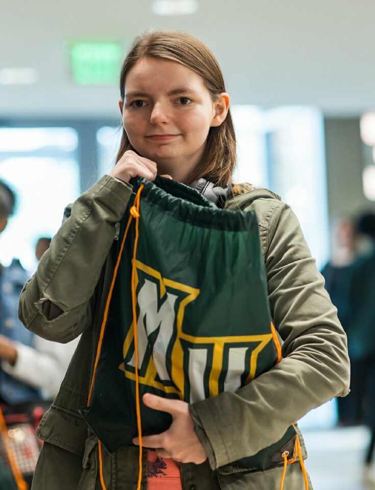 A prospective student at Fall Open House