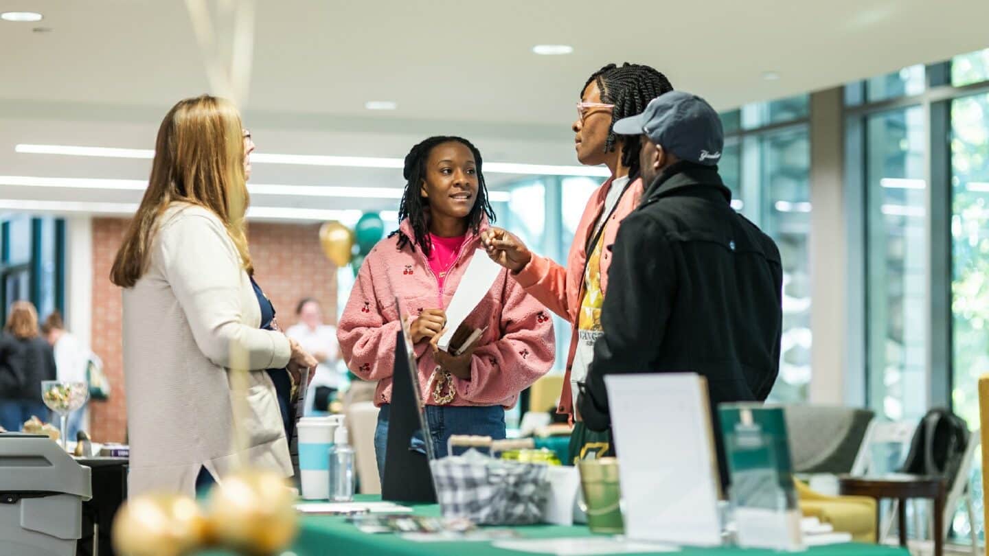 Prospective students at Fall Open House meet with the Pre-Nursing advisor
