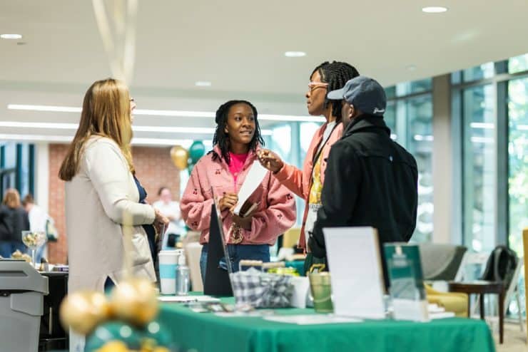 Prospective students at Fall Open House meet with the Pre-Nursing advisor