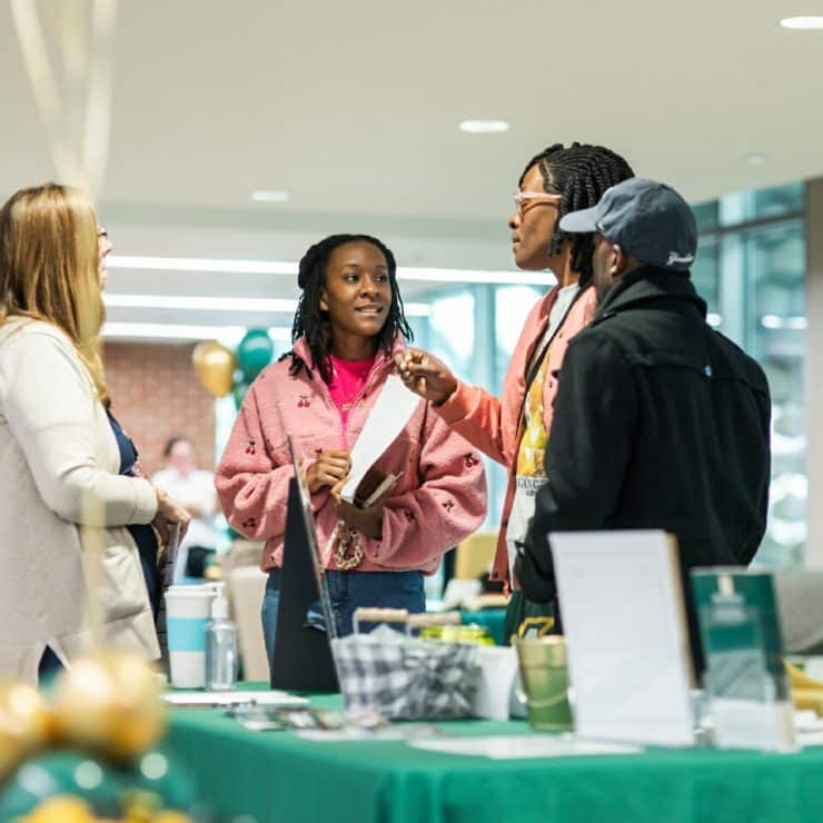 Prospective students at Fall Open House meet with the Pre-Nursing advisor