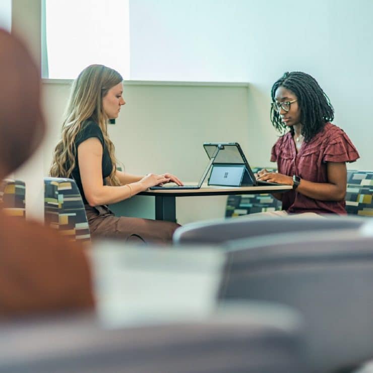 Students meet to study in the Information Commons